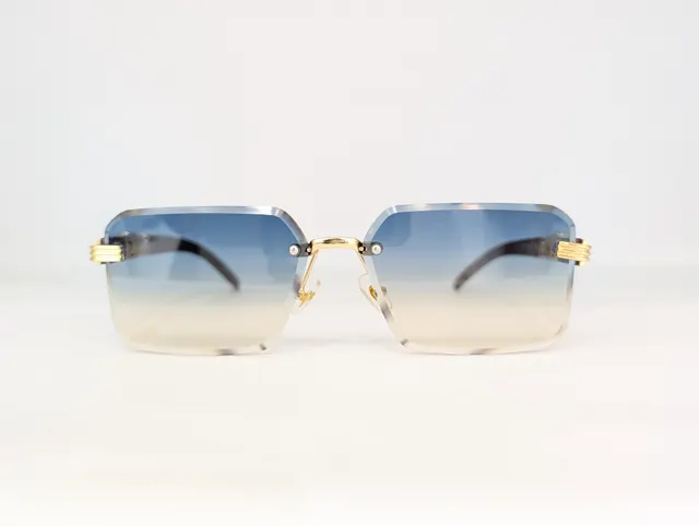 CARTIER RIMLESS( BLUISH YELLOW) Q00188